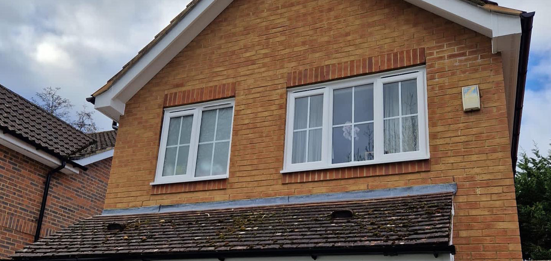 New build house newbury with new white casement windows