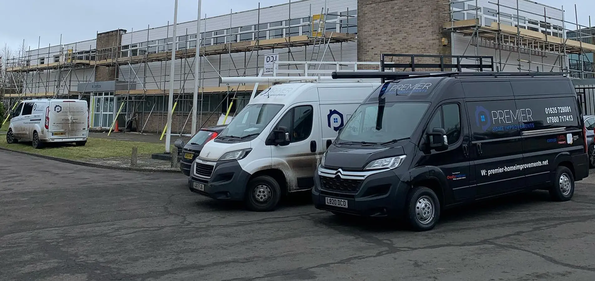 Premier home improvements vans lined up in newbury