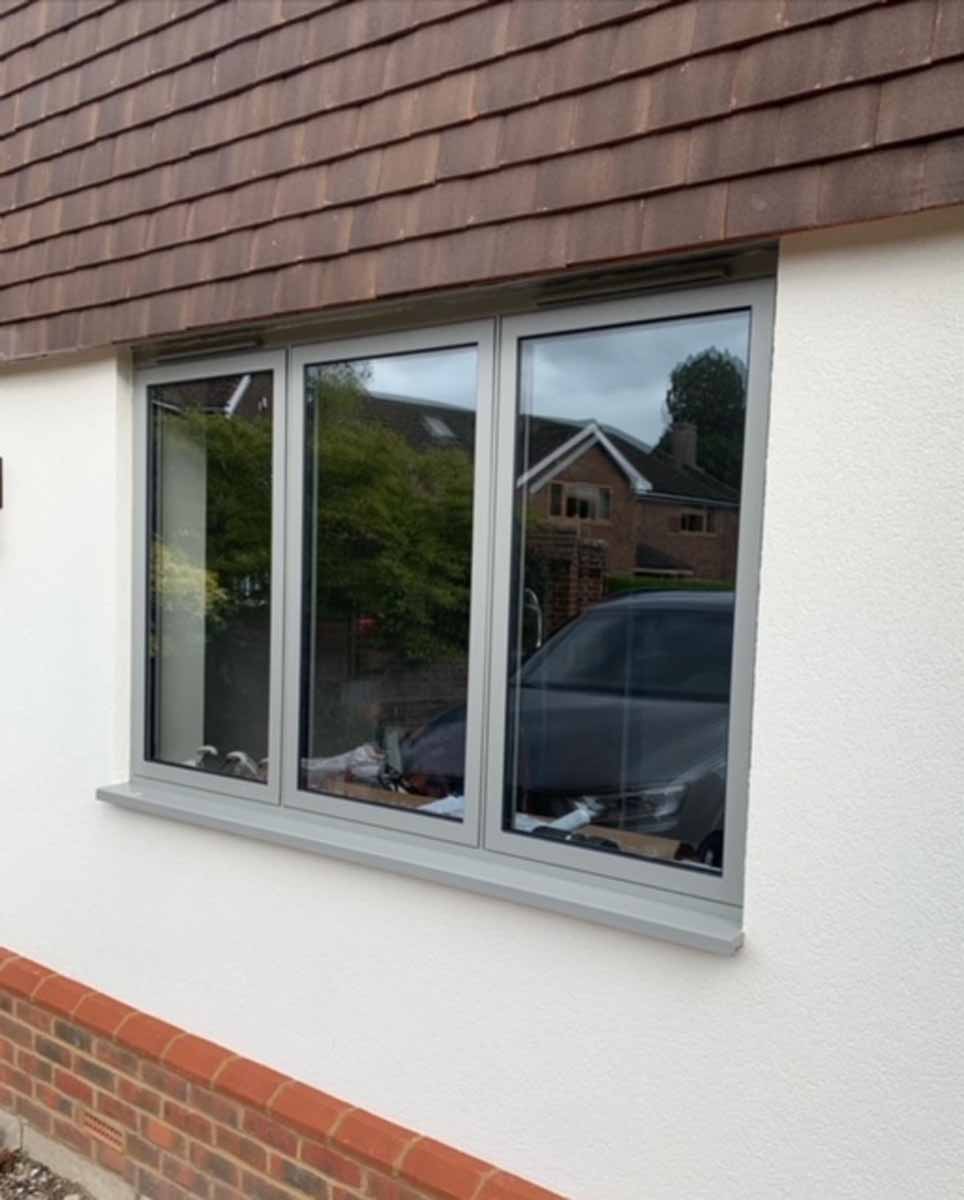 Light grey aluminium windows with slim frames installed in Newbury