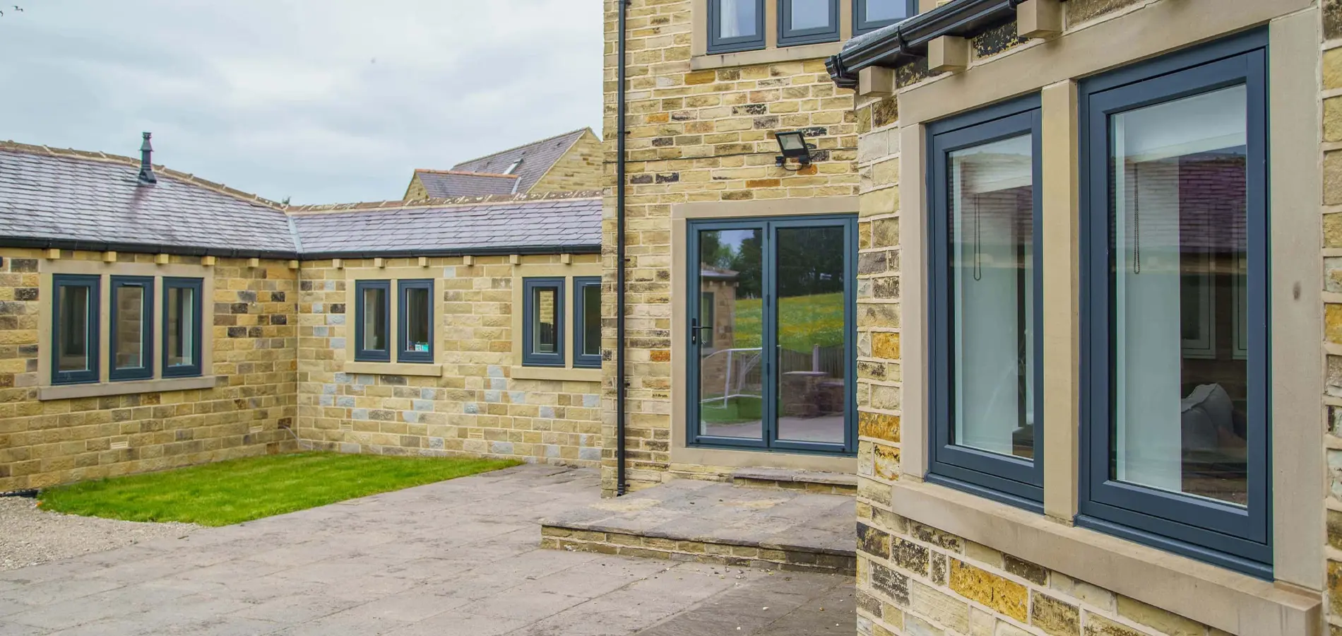 External view of grey residence 7 flush sash windows fitted in newbury